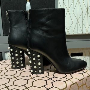 Studded heel leather boots mint condition. One stud is missing.